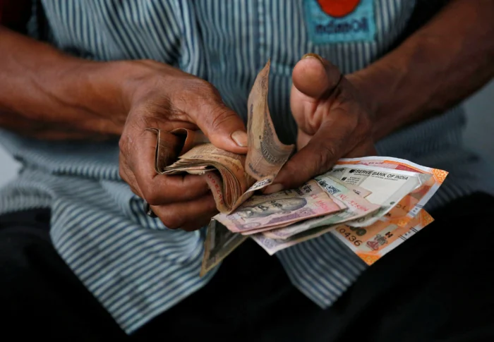 A member handing over some cash